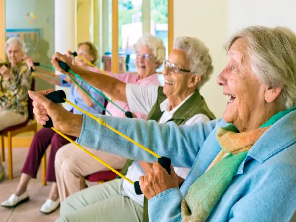 Group of elderly women exercising together